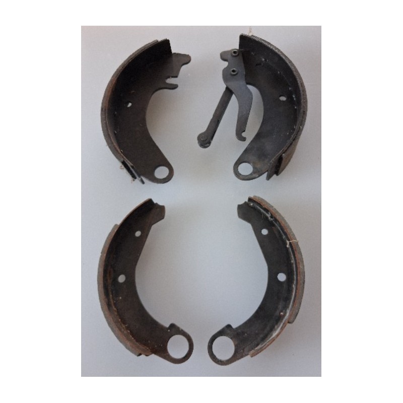 Set of front brake shoes big + rear brake shoes NOS
